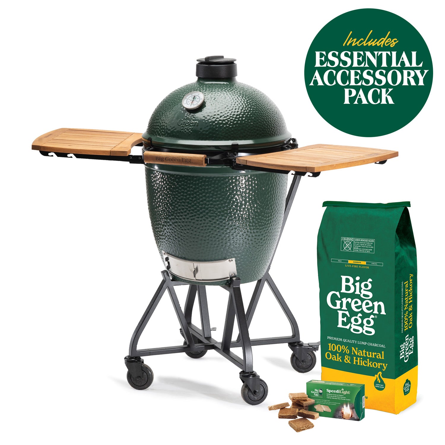 Large Big Green Egg in a nest with wooden shelves, with charcoal, firestarters and an Essential accessory-pack badge