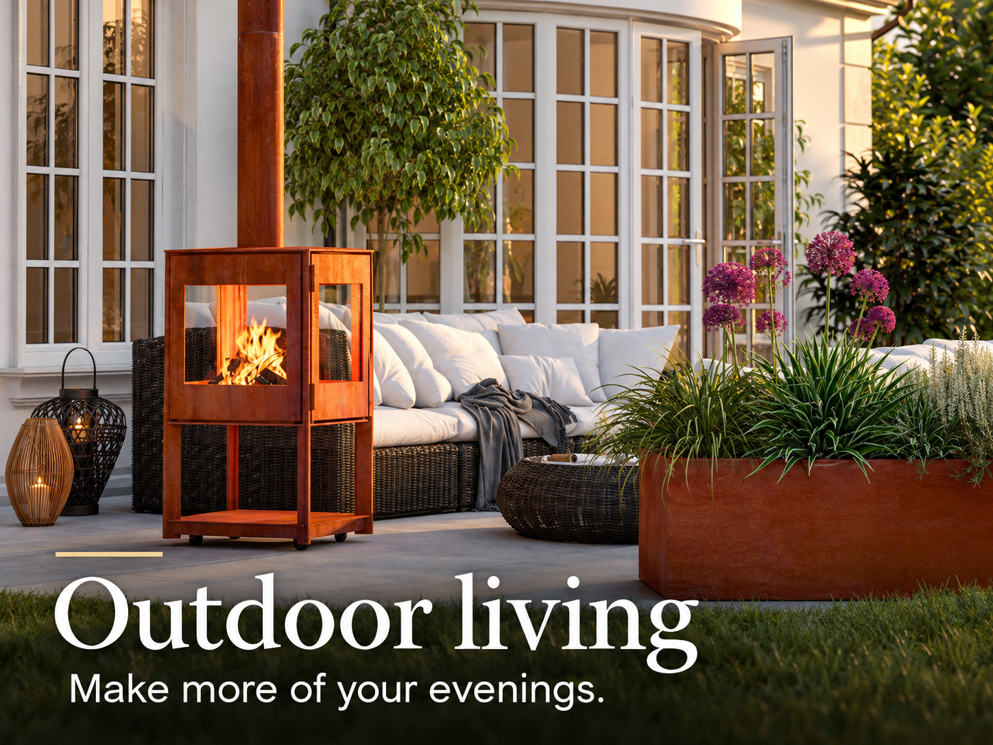 Outdoor living. Make more of your evenings. Lit HWAM outdoor stove on a furnished terrace