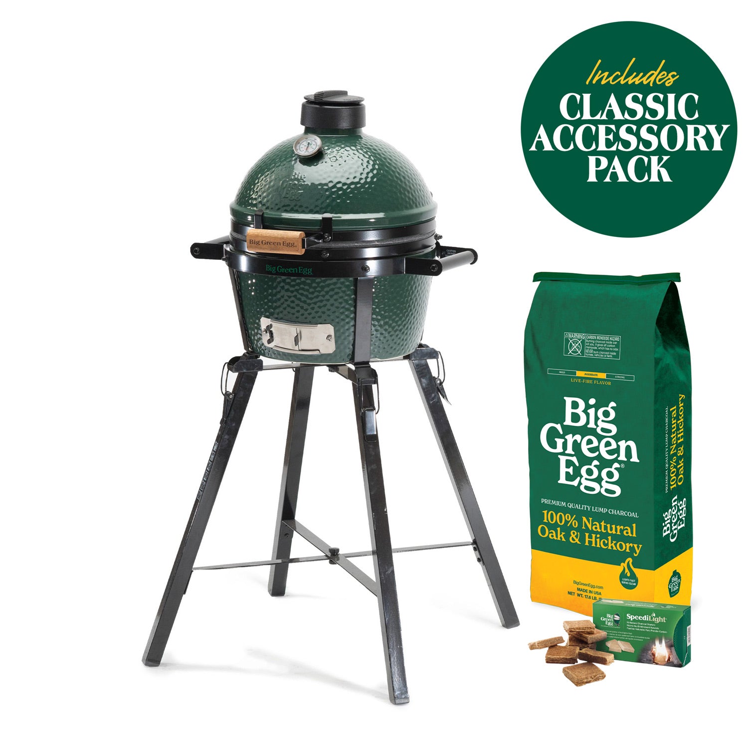 MiniMax Big Green Egg on a foldable stand, with charcoal, firestarters and a Classic accessory-pack badge