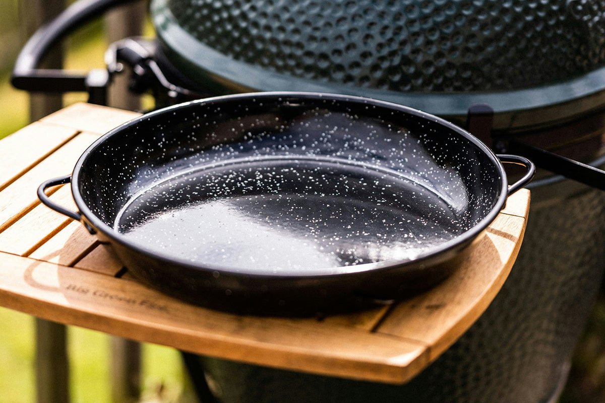 Close-up of the Big Green Egg Paella Pan with a clean enamel finish