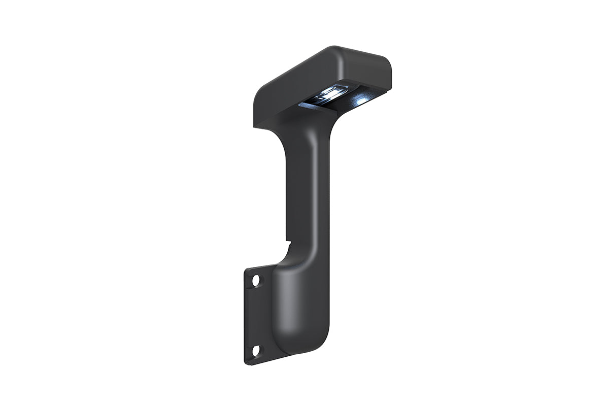 Traeger Pellet Sensor viewed at an angle, showing its illuminated underside and mounting holes