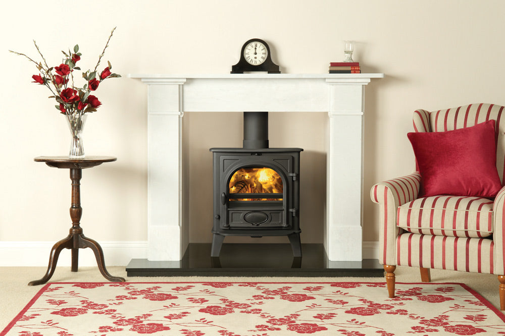 Stovax Claremont natural limestone mantel shown with a separately supplied Stockton 5 stove and hearth