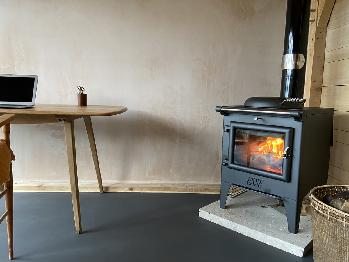 Angled view of the ESSE Warmheart wood-fired cook stove
