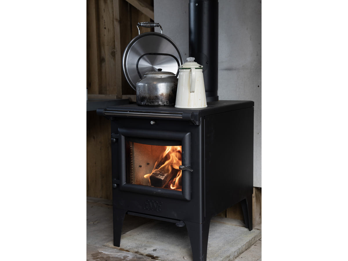 Angled view of the ESSE Warmheart wood-fired cook stove