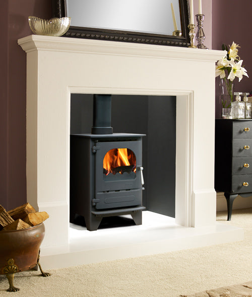Dunsley Highlander 5 Enviroburn Solo with a curved-corner window burning logs