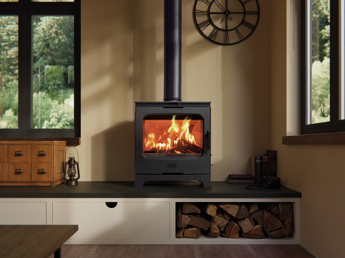 ESSE 775F wood-burning stove installed in a furnished room
