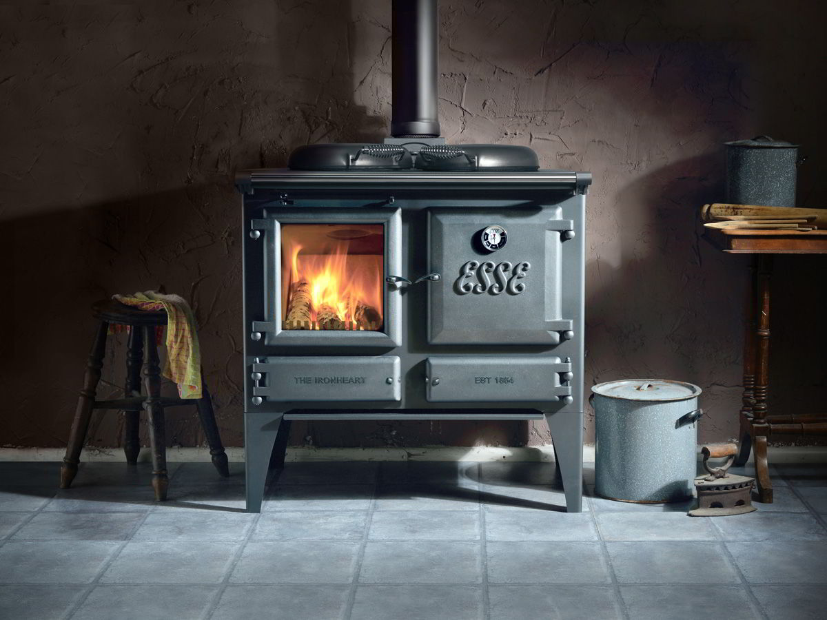 ESSE Ironheart wood-fired cook stove installed in a furnished room