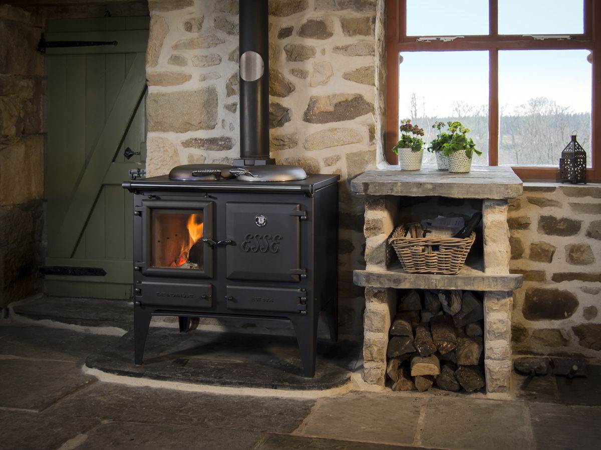 ESSE Ironheart wood-fired cook stove installed in a furnished room