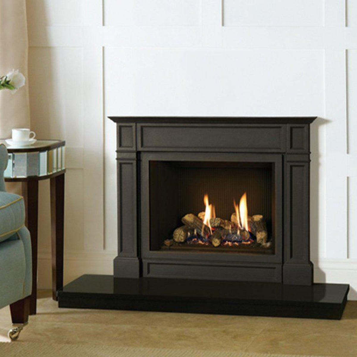 Gazco Riva2 500 Ellingham cast iron gas fire with black reeded lining in a panelled room