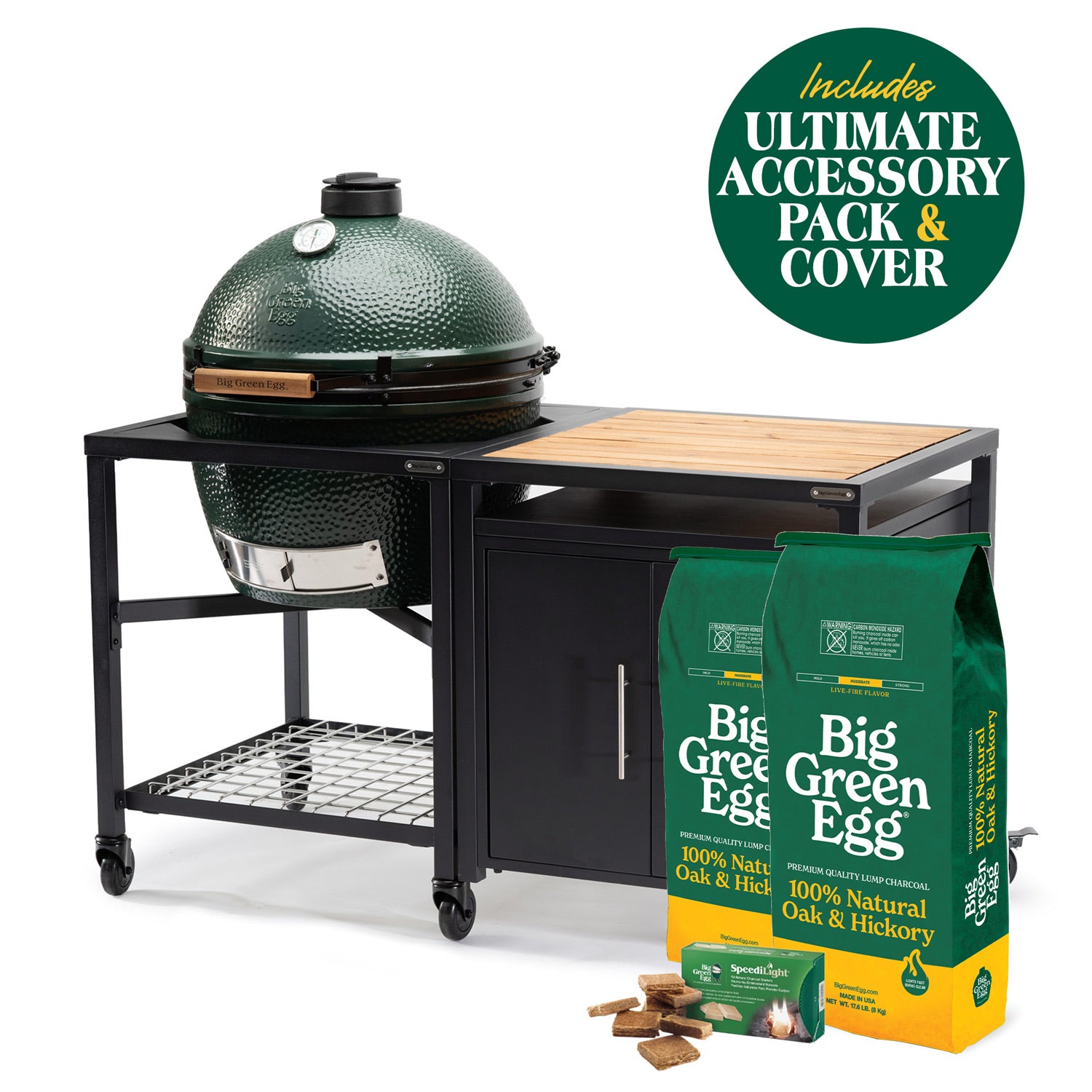 XL Big Green Egg in a modular nest beside a cabinet, with charcoal, firestarters and an Ultimate accessory-pack badge
