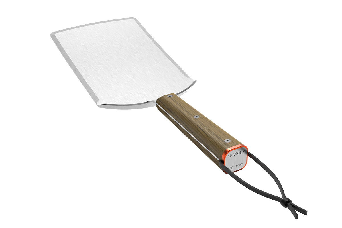 Angled view of the Traeger Large Cut BBQ Spatula showing the branded handle end and hanging loop